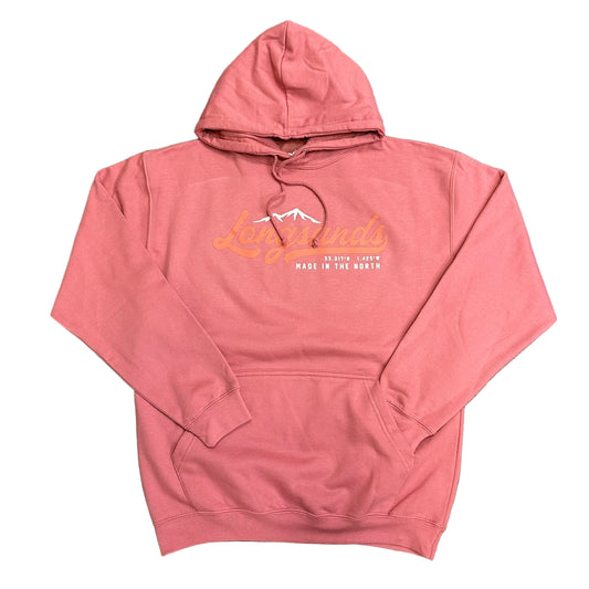 Pink hoodie with text and mountain graphic